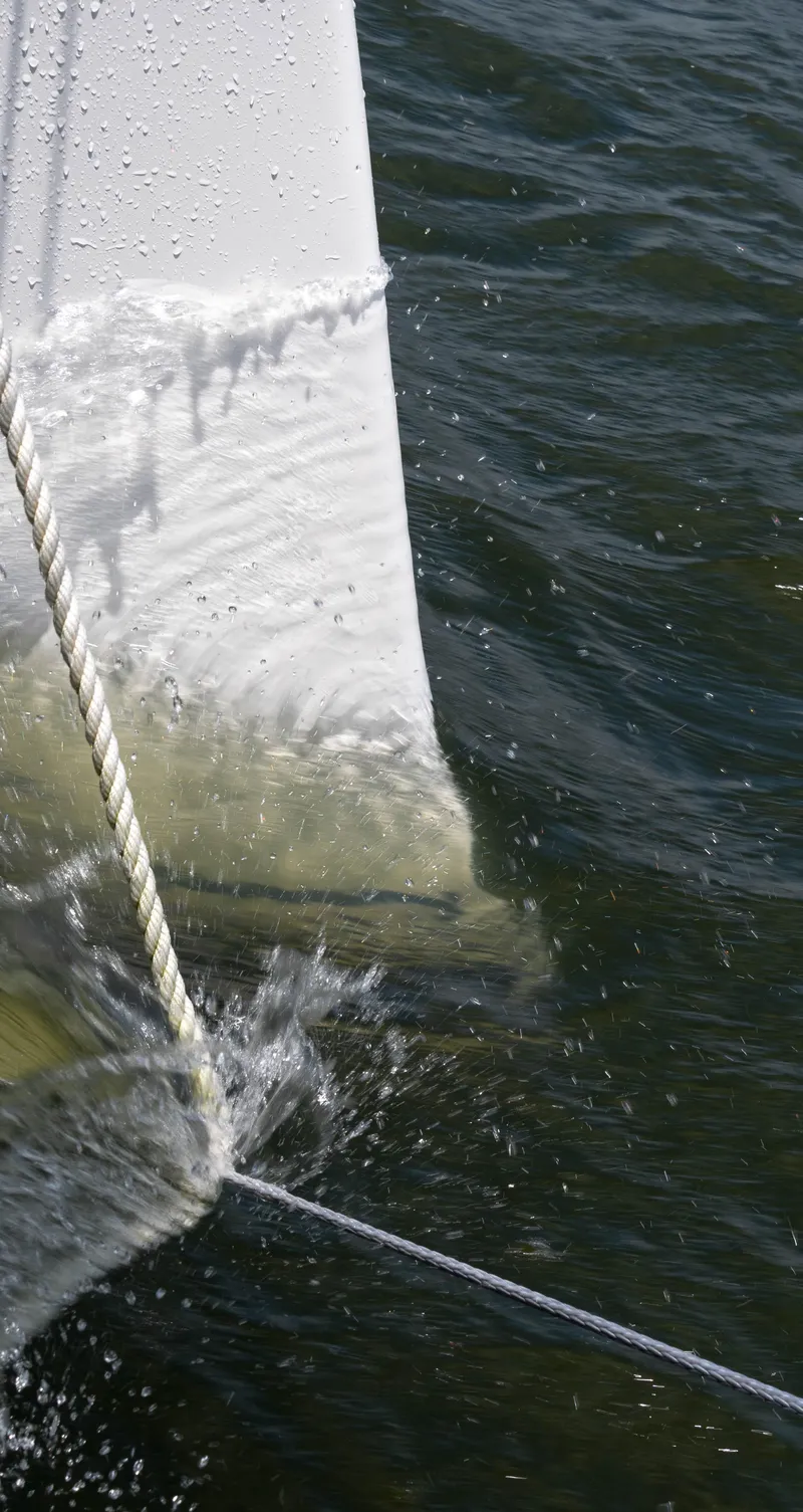 Slide: The Image of Sailboat bow cutting through water, Balance 451, 2017 model. - 33