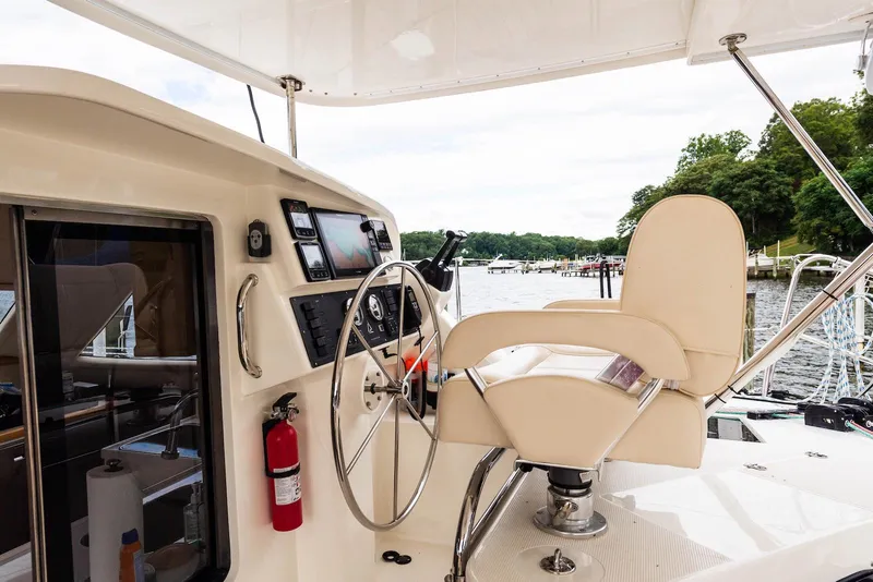 Slide: The Image of Helm of 2017 Balance 451 yacht with steering wheel and navigation equipment. - 4