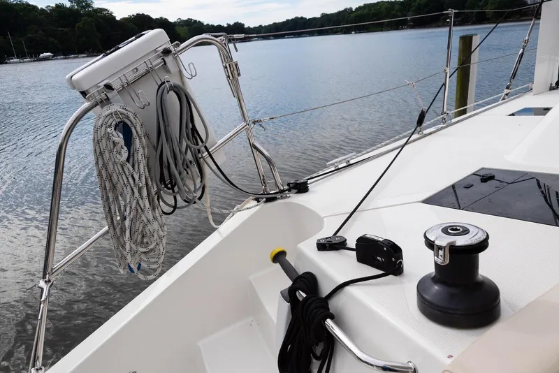 Slide: The Image of Sailboat deck with ropes and winch, Balance 451 model, 2017, on calm water. - 43