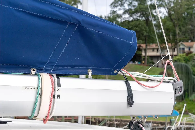Slide: The Image of Close-up of a Balance 451 sailboat boom with blue sail cover, 2017 model. - 44