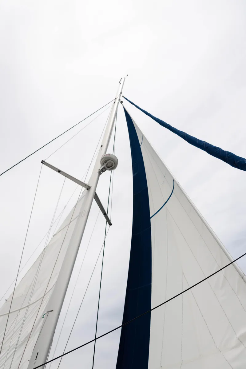 Slide: The Image of Sailboat mast and sails against cloudy sky, Balance 451 model, 2017. - 8