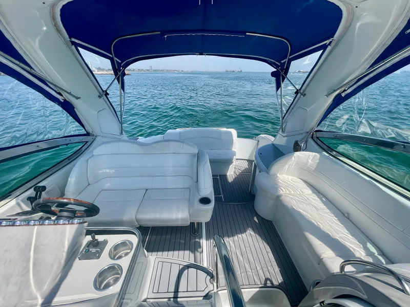 Slide: The Image of 2004 Formula 37 PC yacht interior with white seating and ocean view. - 34