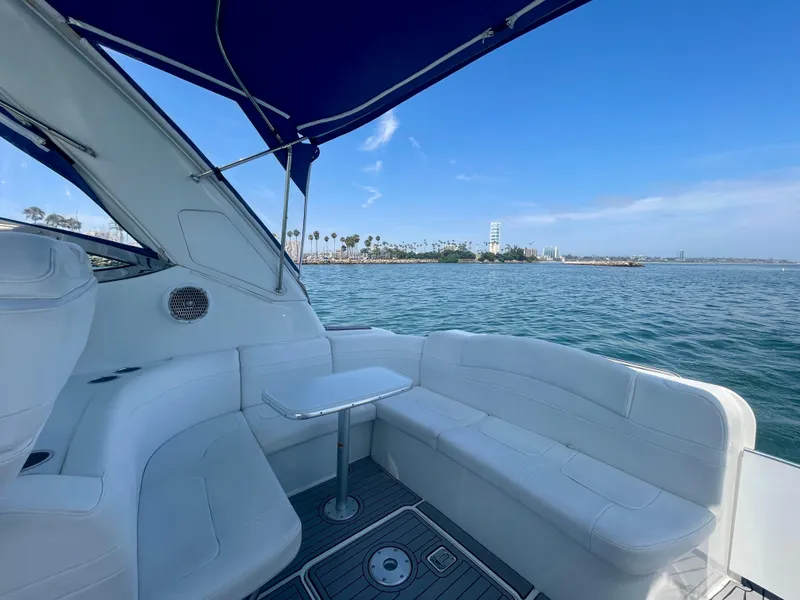 Slide: The Image of 2004 Formula 37 PC yacht interior with ocean view and blue canopy. - 38