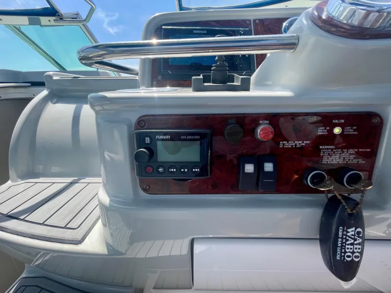 Slide: The Image of Control panel of a 2004 Formula 37 PC boat with navigation equipment. - 43