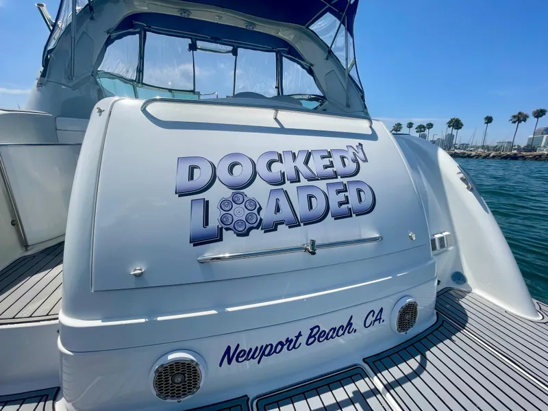 Slide: The Image of 2004 Formula 37 PC yacht docked at Newport Beach, CA, with "Docked & Loaded" text. - 48
