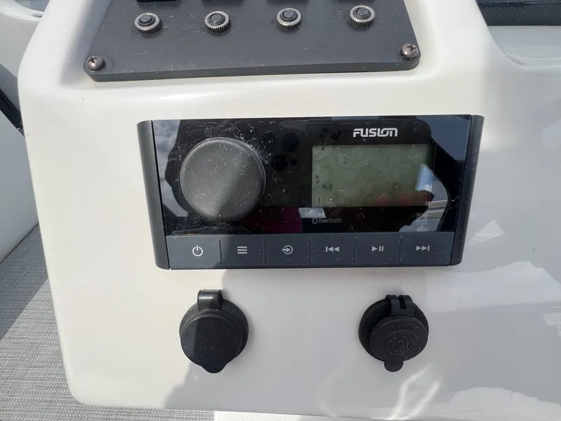 Slide: The Image of Fusion audio system on 2022 Crest Classic Fish 200 boat dashboard. - 18