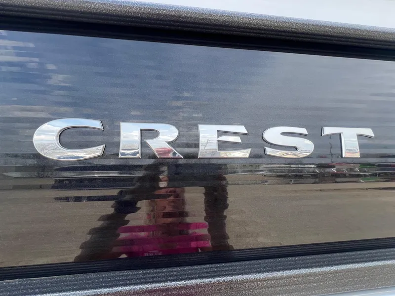 Slide: The Image of 2022 Crest Classic Fish 200 logo on a reflective surface. - 4