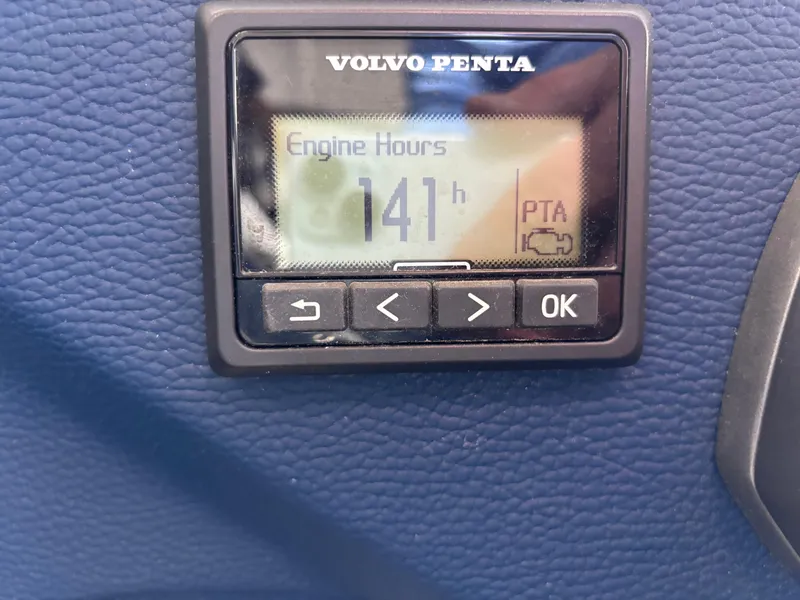 Slide: The Image of Volvo Penta engine hour meter displaying 141 hours on a 2022 Cobalt A29. - 12