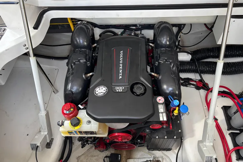 Slide: The Image of Engine compartment of a 2022 Cobalt A29 boat featuring a Volvo Penta 380 V8 engine. - 15