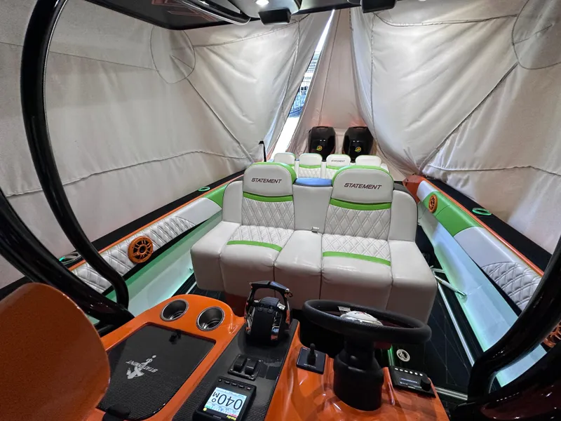 Slide: The Image of Interior of 2017 Statement 350 Open boat with modern seating and vibrant accents. - 14