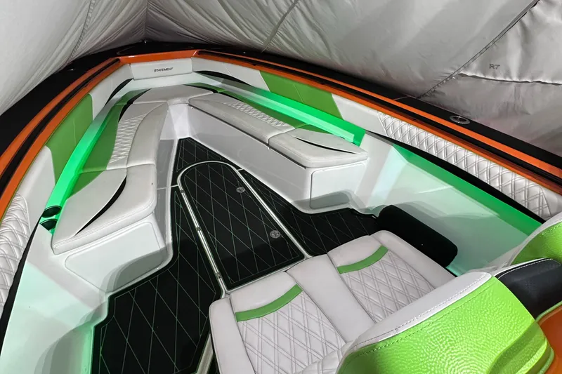 Slide: The Image of Luxurious interior of 2017 Statement 350 Open boat with vibrant green and white seating. - 23