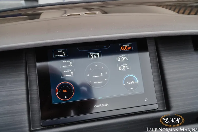 Slide: The Image of Garmin display on 2024 Bennington 23LSB boat dashboard at Lake Norman Marina. - 14