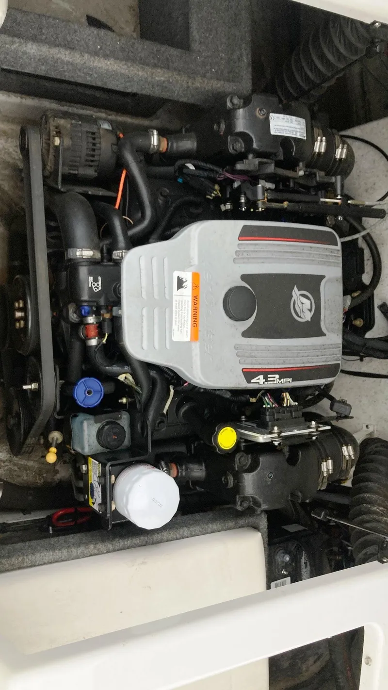 Slide: The Image of Engine of 2016 Glastron GT 205 boat, showcasing mechanical components and design. - 8