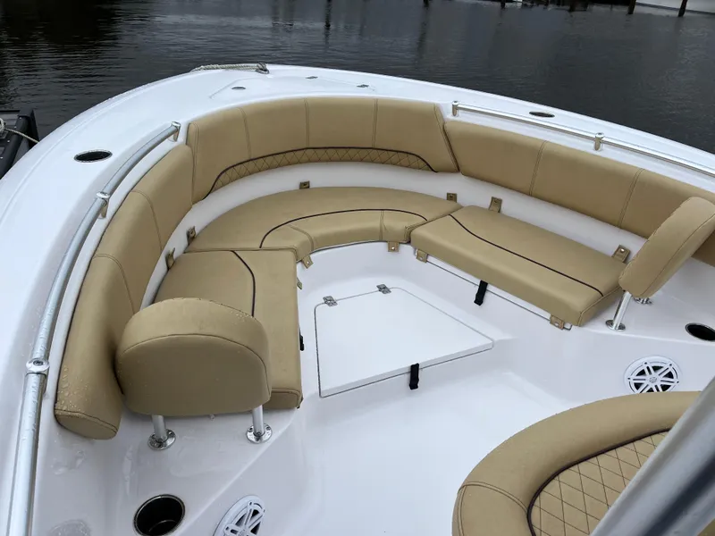 Slide: The Image of 2022 Sportsman Heritage 231 Center Console boat with tan seating and spacious deck. - 5