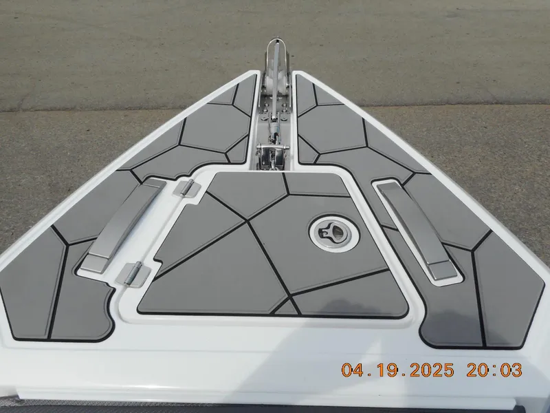 Slide: The Image of 2025 Highfield Sport 760 boat deck with geometric design and anchor system. - 17