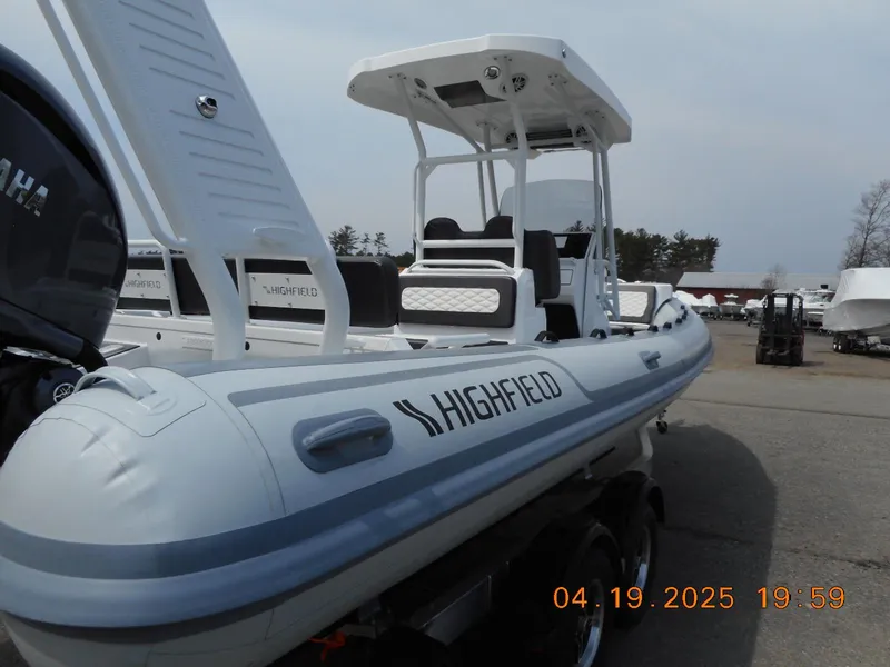 Slide: The Image of 2025 Highfield Sport 760 boat on trailer, featuring sleek design and modern amenities. - 8