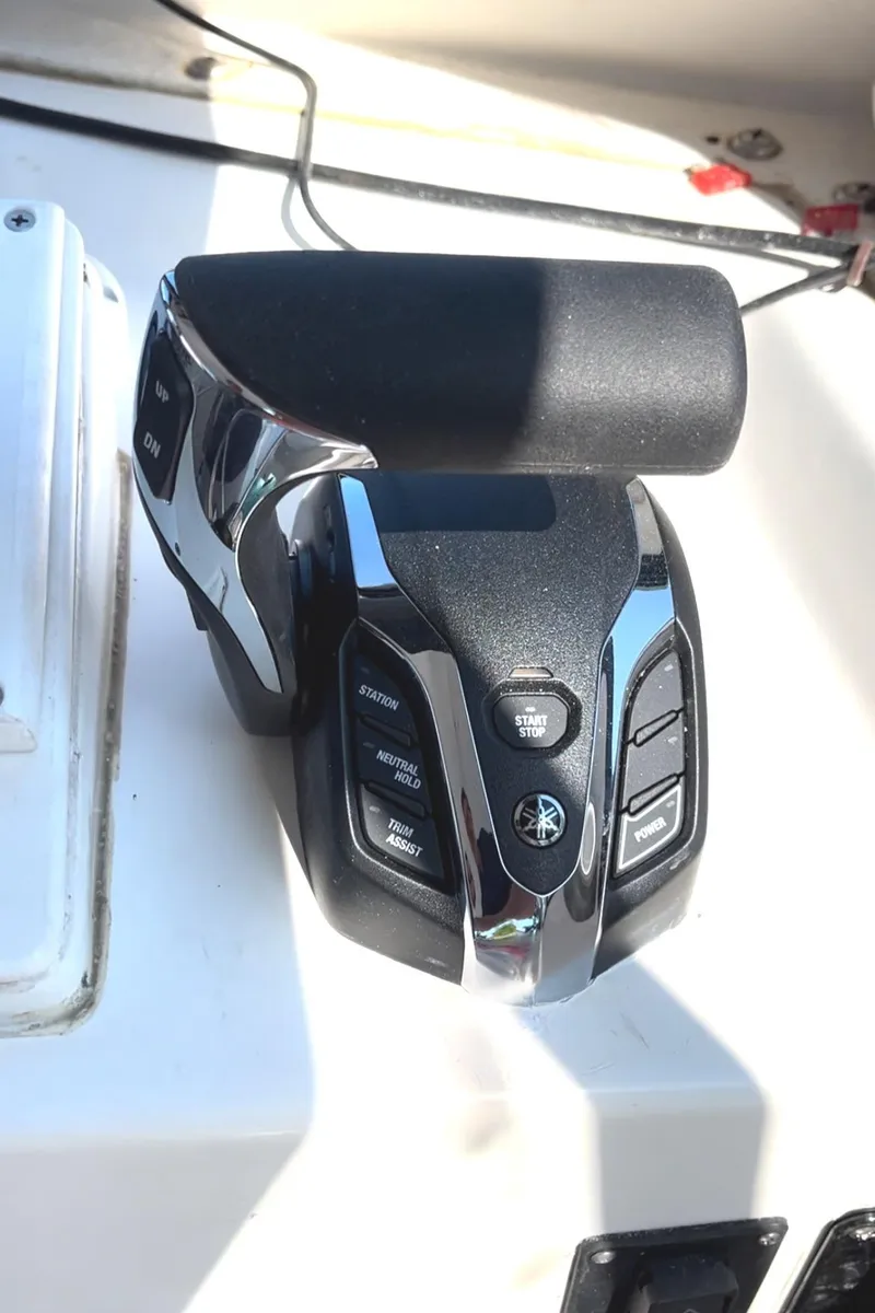 Slide: The Image of Boat throttle control on a 2007 Eastern 27 model. - 22