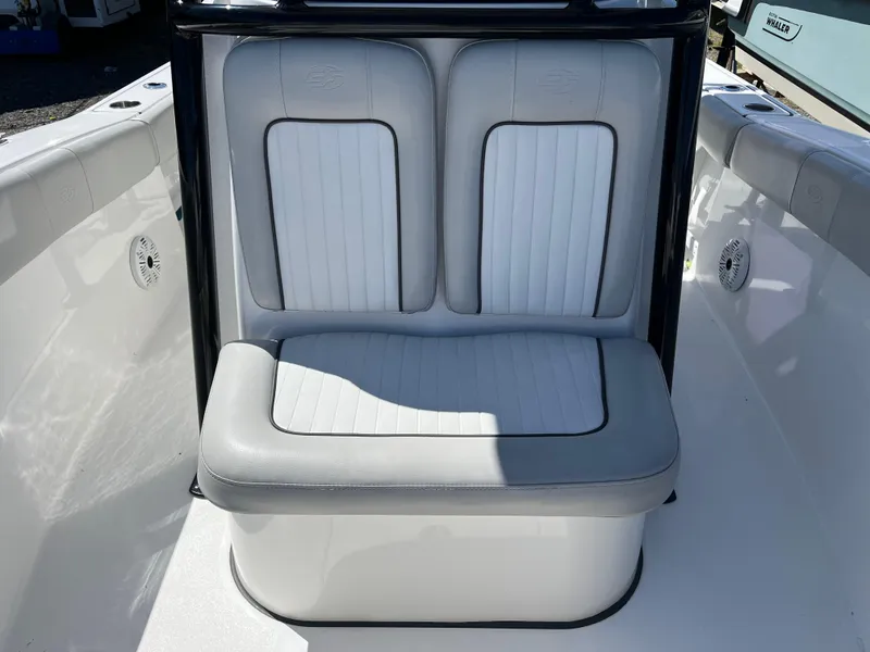 Slide: The Image of 2021 Sea Fox 248 Commander boat seating with white and gray upholstery. - 10