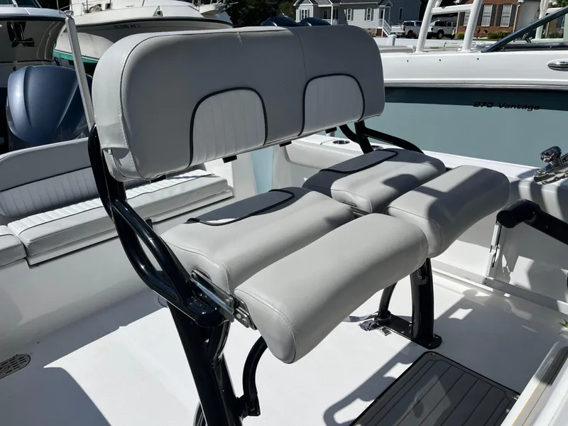 Slide: The Image of 2021 Sea Fox 248 Commander boat seating with cushioned bench and sleek design. - 12
