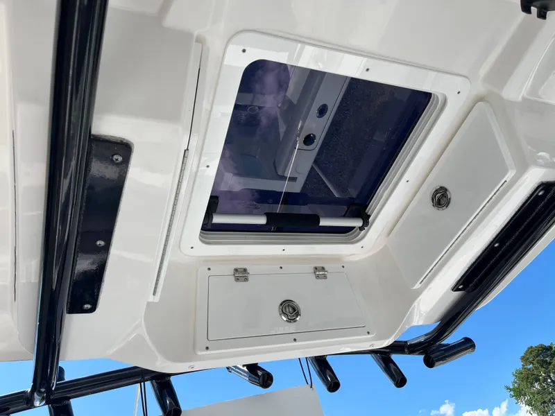 Slide: The Image of 2021 Sea Fox 248 Commander boat hatch and storage compartments, viewed from below. - 20