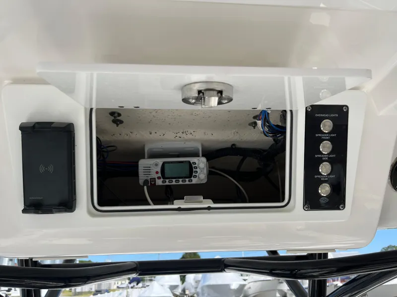 Slide: The Image of 2021 Sea Fox 248 Commander dashboard with control panel and electronic display. - 21