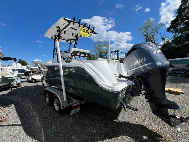 Slide: The Image of 2021 Sea Fox 248 Commander boat with Yamaha engine, for sale in a sunny outdoor lot. - 24