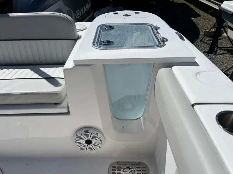 Slide: The Image of 2021 Sea Fox 248 Commander boat interior with seating and storage compartment. - 5