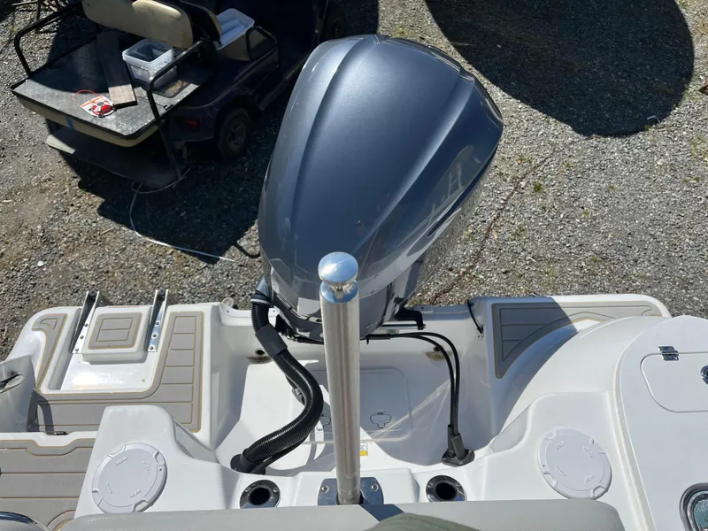 Slide: The Image of 2021 Sea Fox 248 Commander boat engine and deck, featuring sleek design and modern equipment. - 6