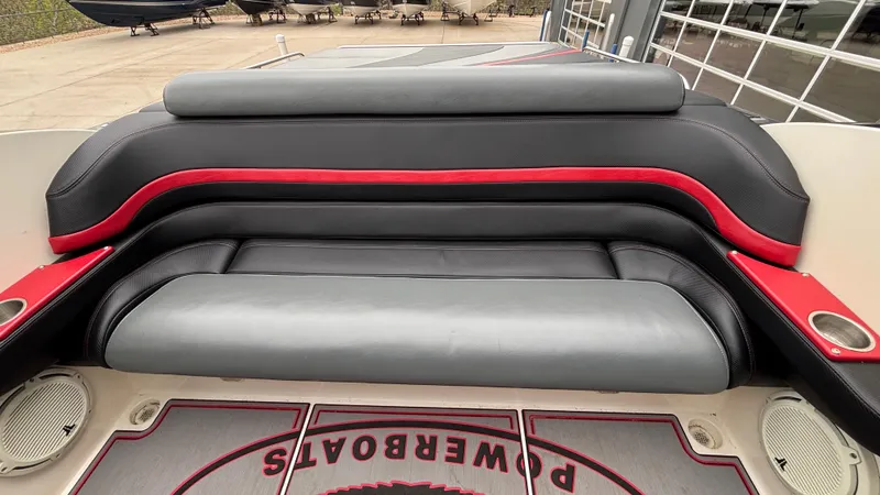 Slide: The Image of 2002 Black Thunder 460 EC boat interior with black and red seating. - 32
