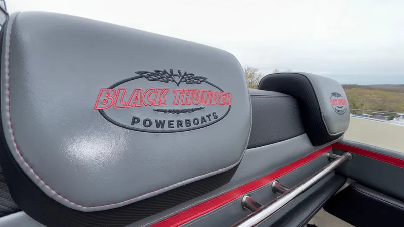 Slide: The Image of Gray leather seats with "Black Thunder Powerboats" logo on a 2002 Black Thunder 460 EC. - 40