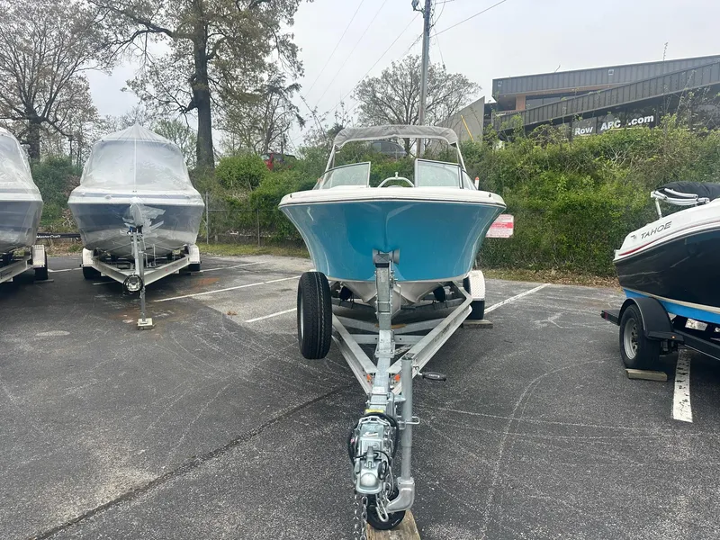 Slide: The Image of 2023 Key West 203 DFS boat on trailer in parking lot. - 8