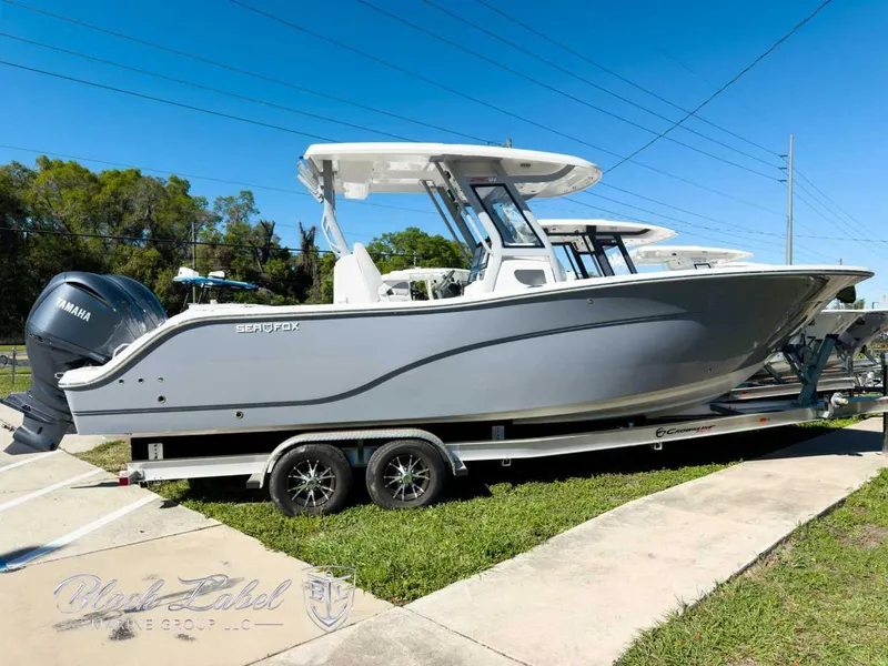 The Image of 2025 Sea Fox 288 Commander boat on trailer, side view, sunny day. - 0
