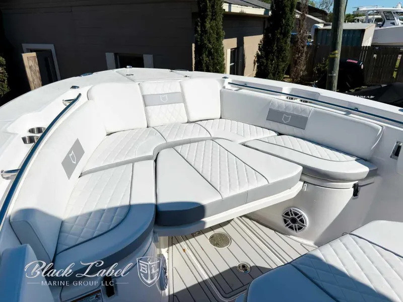 Slide: The Image of Luxurious seating area on 2025 Sea Fox 288 Commander boat, featuring elegant white upholstery. - 10