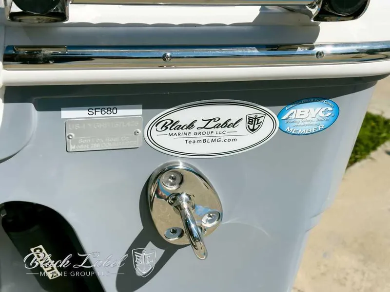 Slide: The Image of 2025 Sea Fox 288 Commander boat with Black Label Marine Group and ABYC member stickers. - 4