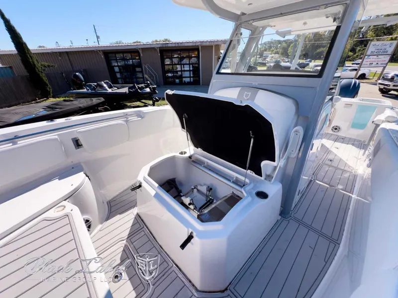 Slide: The Image of 2025 Sea Fox 288 Commander boat interior with open storage compartment. - 8