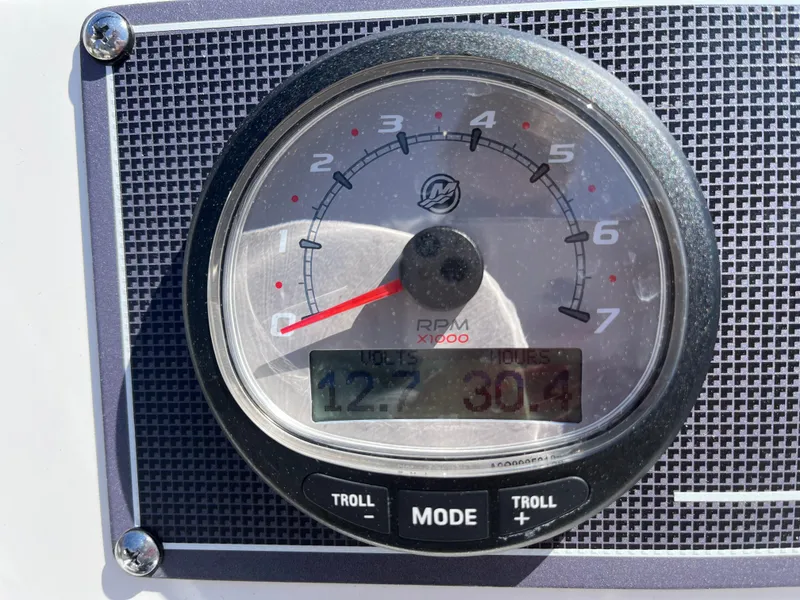 Slide: The Image of Tachometer display on 2024 Boston Whaler 150 Montauk boat dashboard. - 12
