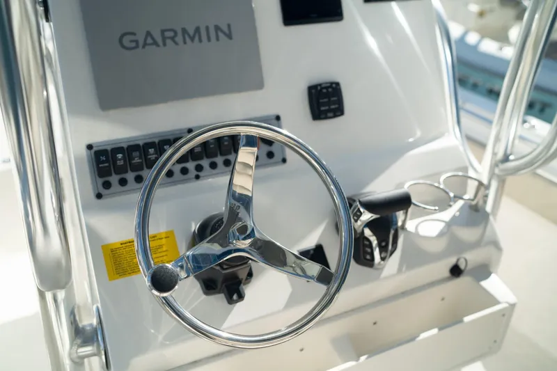Slide: The Image of Steering console of 2024 Key West 219 FS boat with Garmin navigation system. - 3