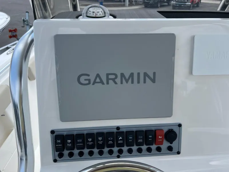 Slide: The Image of Control panel of 2024 Key West 239 FS boat with Garmin display. - 11