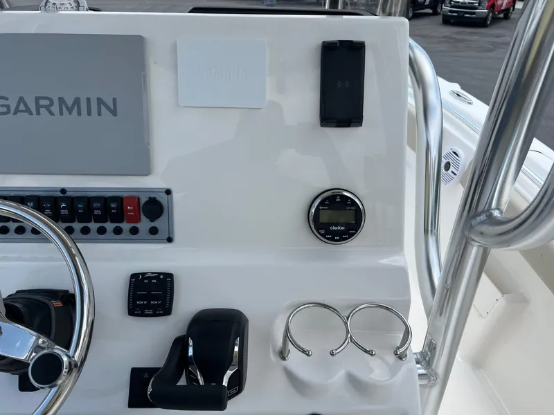 Slide: The Image of 2024 Key West 239 FS boat dashboard with Garmin navigation system and controls. - 12