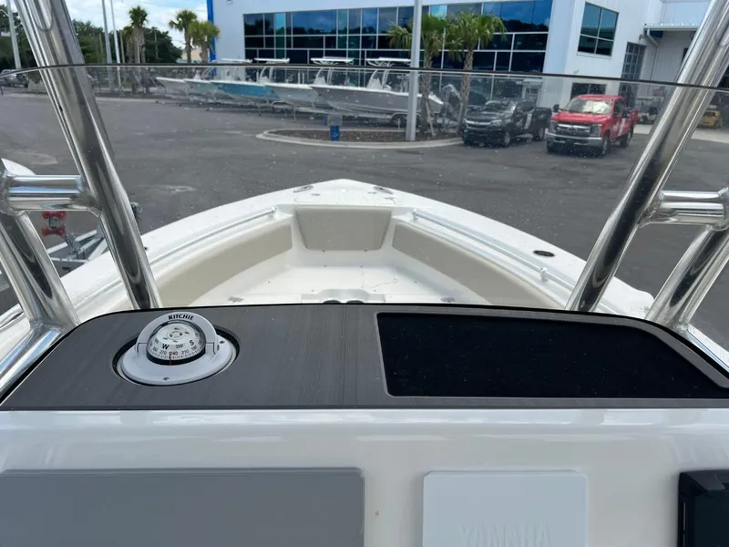 Slide: The Image of 2024 Key West 239 FS boat dashboard view at a dealership. - 13