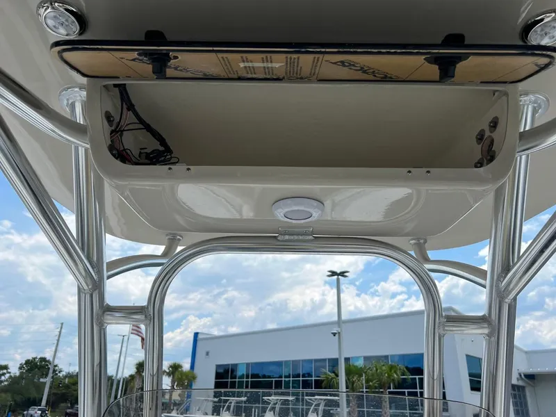 Slide: The Image of 2024 Key West 239 FS boat interior view with open storage compartment. - 14