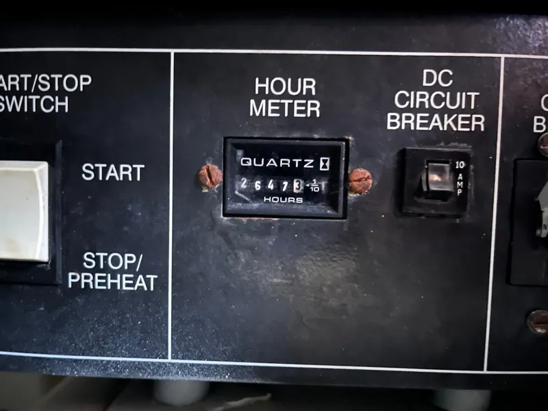 Slide: The Image of Control panel of 2000 Carver 396 Motor Yacht with hour meter and circuit breaker. - 38