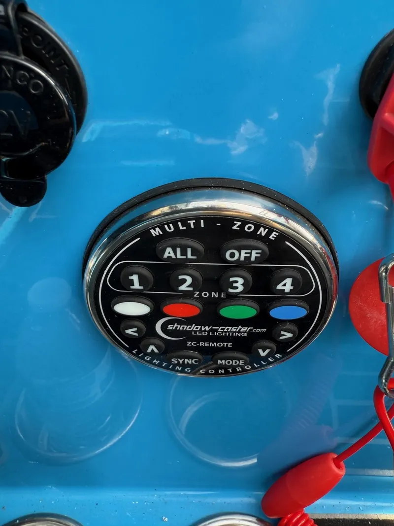 Slide: The Image of Control panel of a 2022 Centurion Fi23 boat with multi-zone settings. - 14