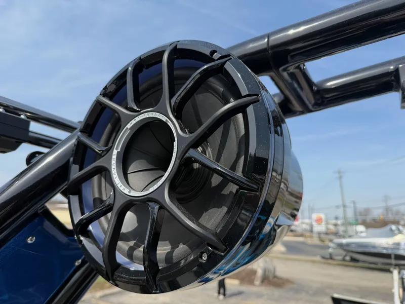 Slide: The Image of Close-up of a Centurion Fi23 2022 boat speaker with a sleek black grille design. - 16