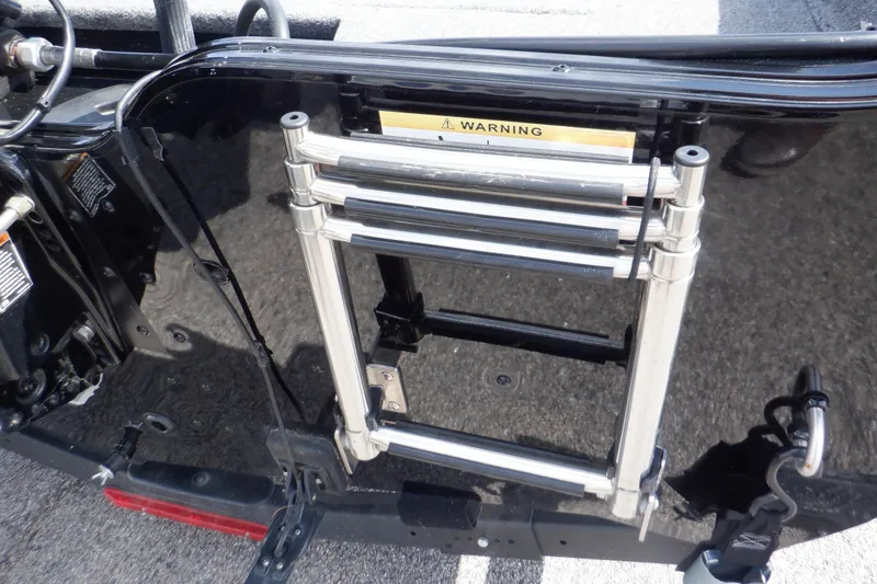 Slide: The Image of 2023 Crestliner 1650 Fish Hawk SE WT boat ladder, folded and mounted on the deck. - 12