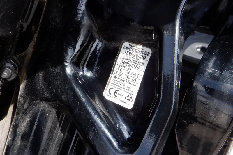 Slide: The Image of 2023 Crestliner 1650 Fish Hawk SE WT engine label, displaying specifications and serial numbers. - 13