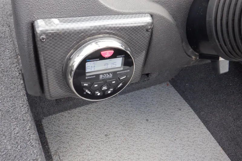 Slide: The Image of 2023 Crestliner 1650 Fish Hawk SE WT dashboard with Boss audio system. - 19