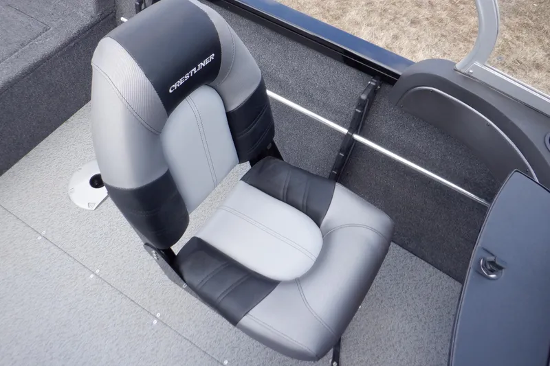 Slide: The Image of 2023 Crestliner 1650 Fish Hawk SE WT boat seat, gray and black design. - 26
