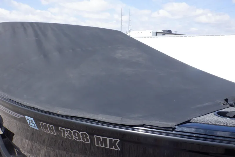 Slide: The Image of 2023 Crestliner 1650 Fish Hawk SE WT boat with cover, side view. - 42