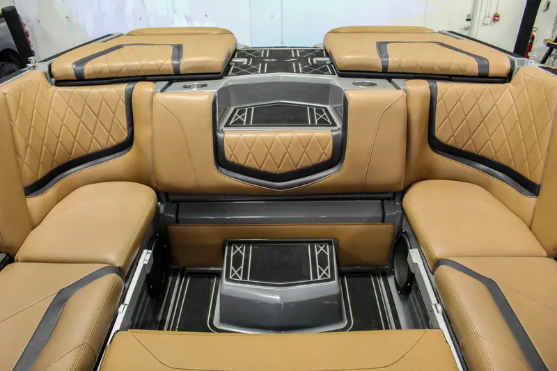 Slide: The Image of Luxurious interior of 2021 Tigé 25ZX boat with tan leather seating and stylish design. - 24